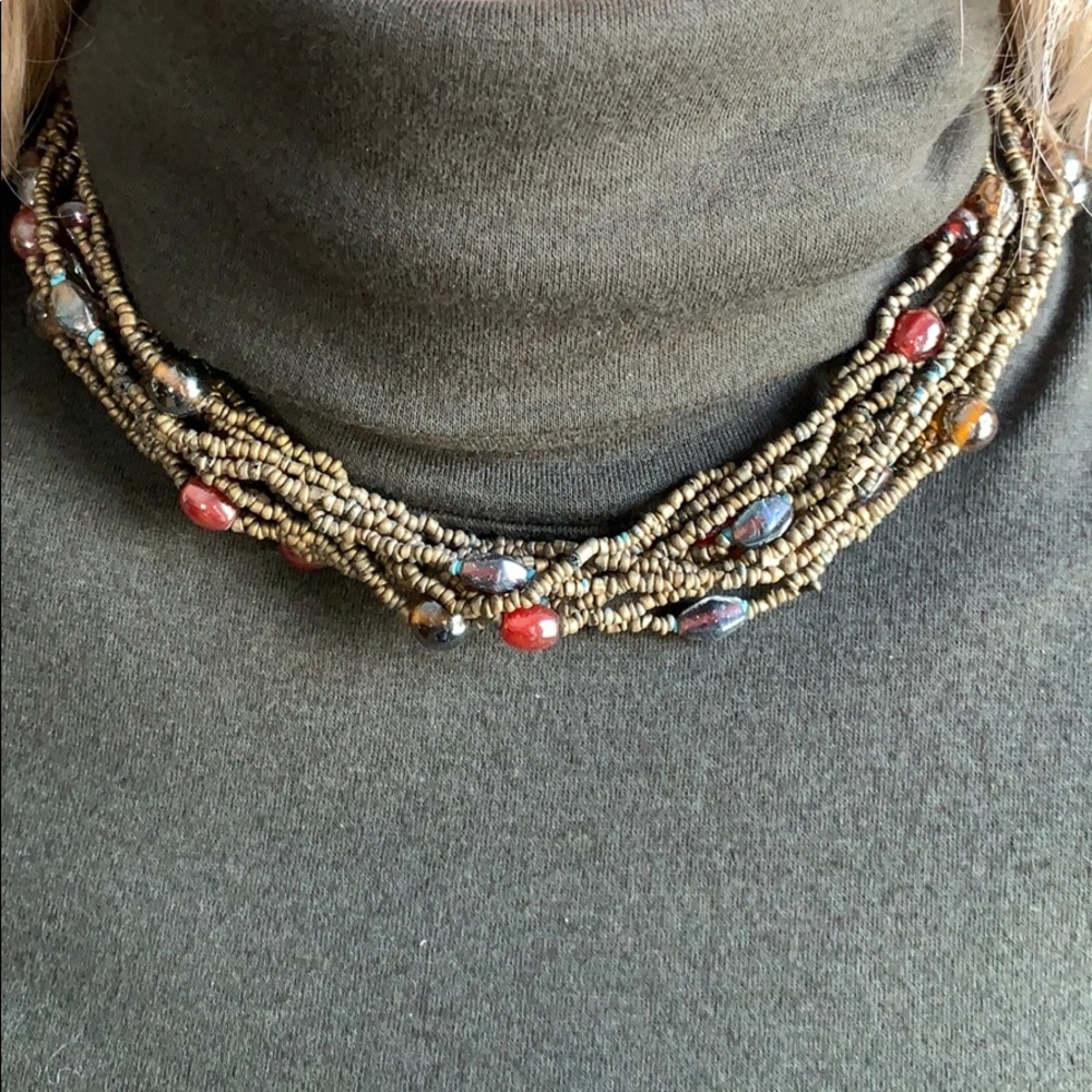 Beaded necklace with different color beads